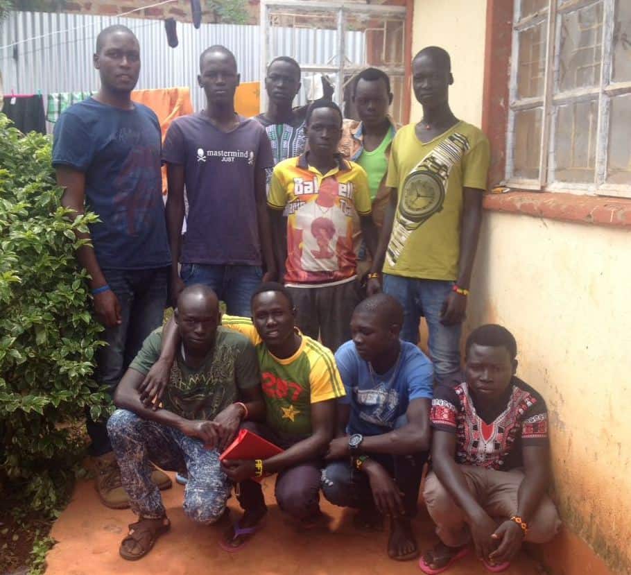 Vincent Owino, Project Coordinator with the 9 8th grade boys in Kenya.